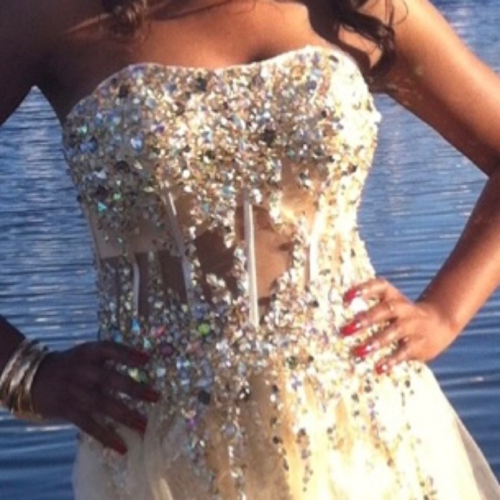 Champagne gold sheer dress! 
Beaded corset and strapless 
Size 4